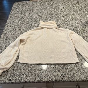Magnolia cream turtleneck sweater